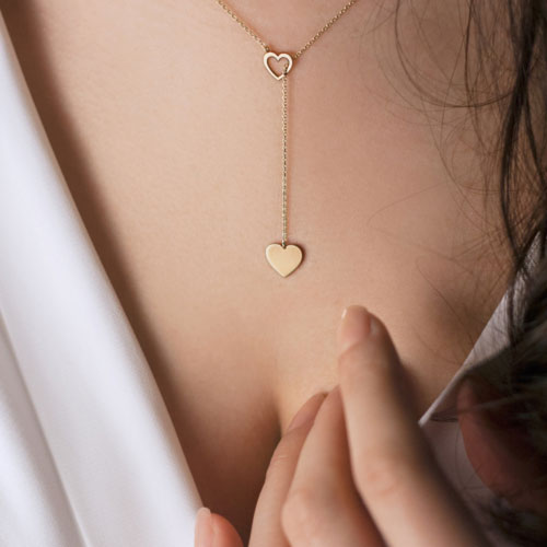 Yellow Gold Heart Necklace, Lariat Style Worn By A Woman