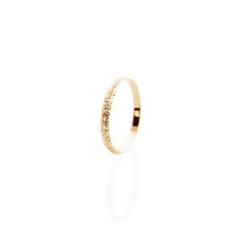 Thin Wedding Band with a Textured Finish in Yellow Gold