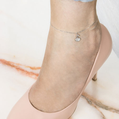 Double Cherry Charm Anklet In White Gold Worn By A Woman