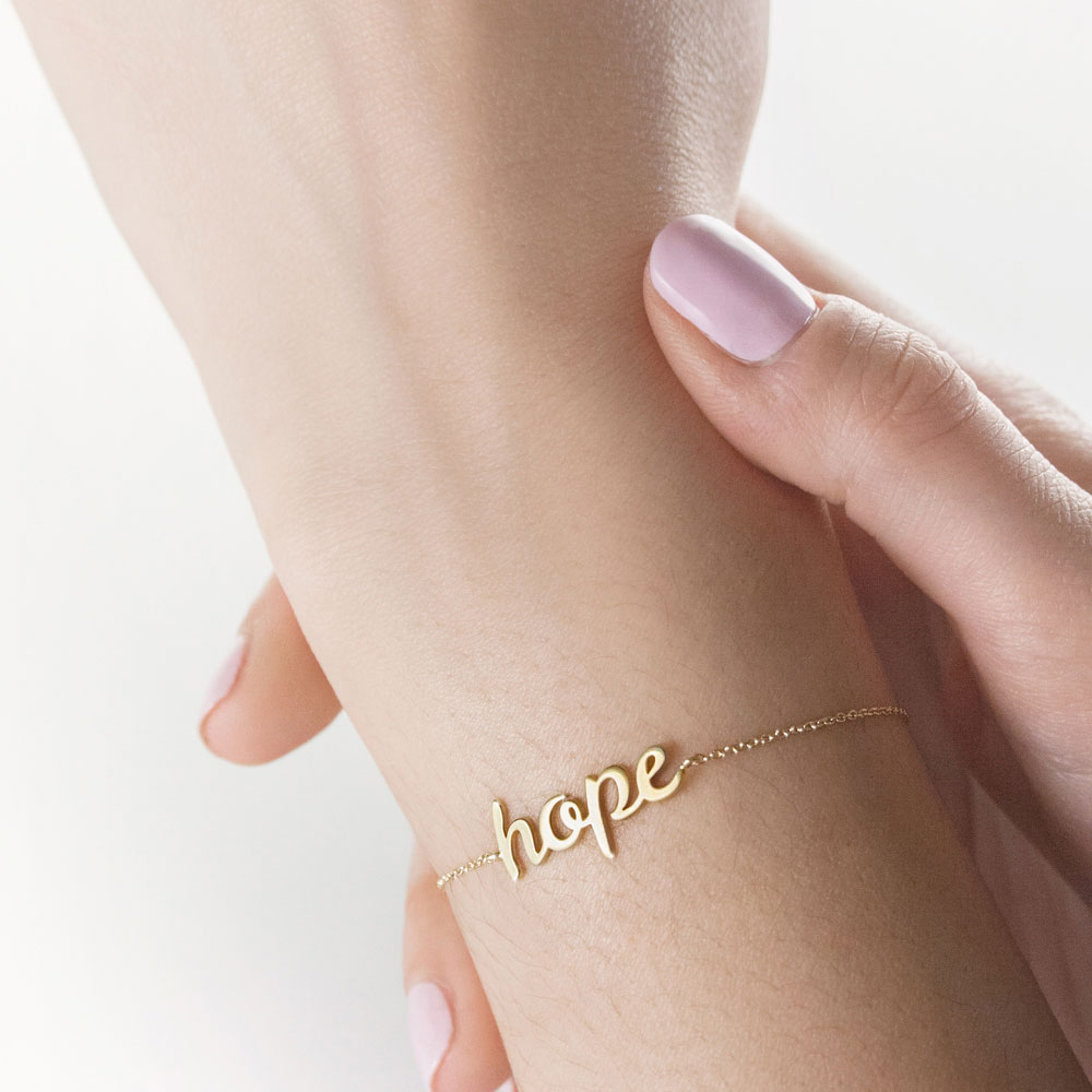 Inspirational “Hope” Bracelet in Yellow Gold, Personalized Worn By A Woman