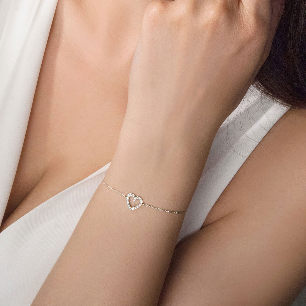 Diamond Heart Bracelet in White Gold Worn By A Woman