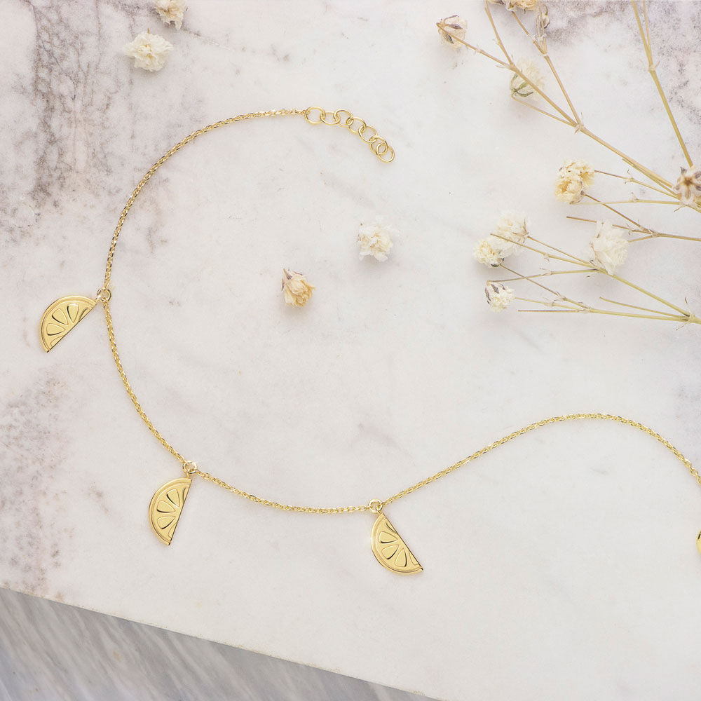 Yellow Gold Bracelet with Dangling Lemon Charms