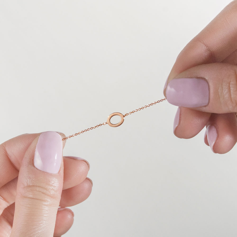 Simple Rose Gold Bracelet with a Small Gold Oval Charm
