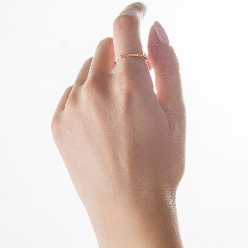 Thin Hexagon Wedding Band in Rose Gold Worn By A Woman
