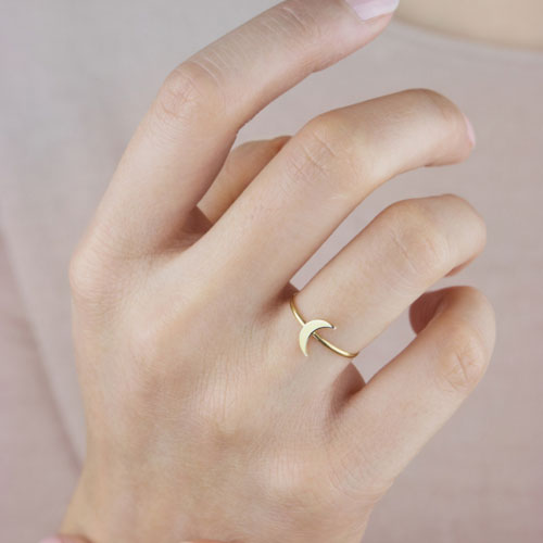 Dainty Crescent Moon Ring in Yellow Gold Worn By A Woman