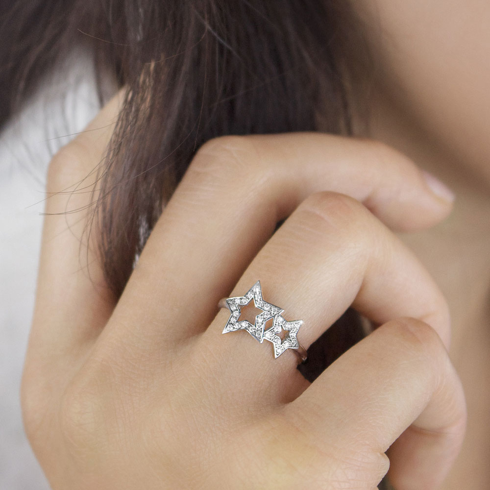 Diamond White Gold Ring with Two Stars Worn By A Woman