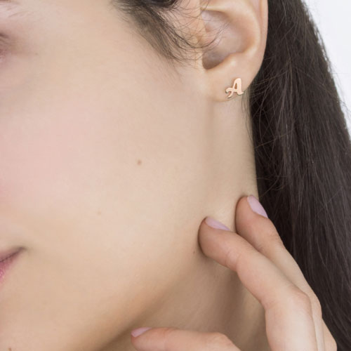 Rose Gold Monogram Single Earring Stud Worn By A Woman