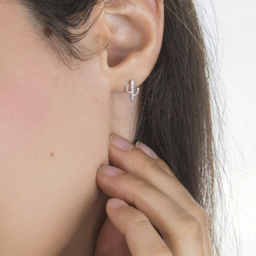 White Gold Cactus Stud Earrings Worn By A Woman