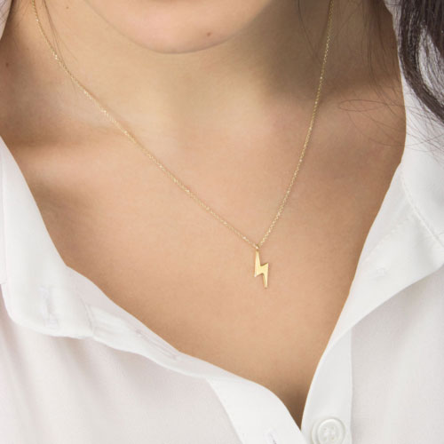 Lightning Bolt Pendant Necklace in Yellow Gold Worn By A Woman
