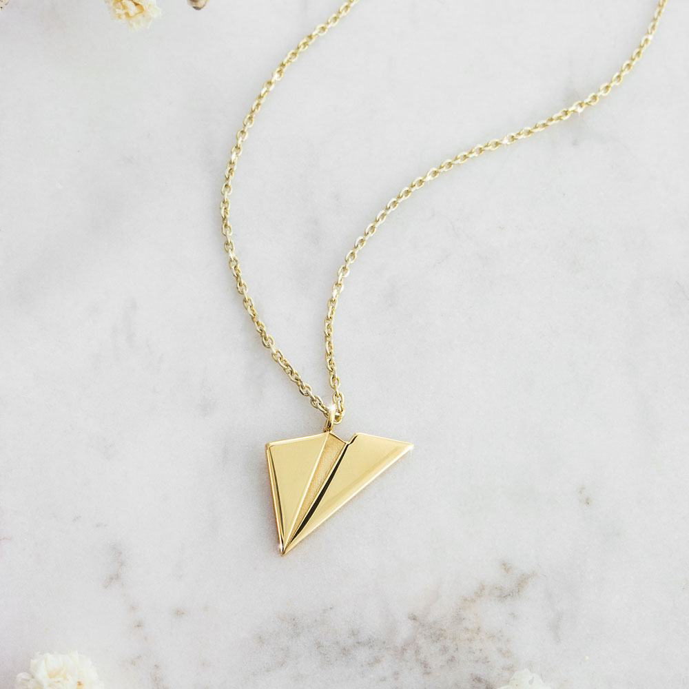A Two Dimensional Paper Plane Pendant Necklace in Yellow Gold