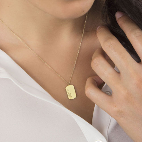 Tiny ID Pendant Necklace in Yellow Gold, Custom-Engraved Worn By A Woman