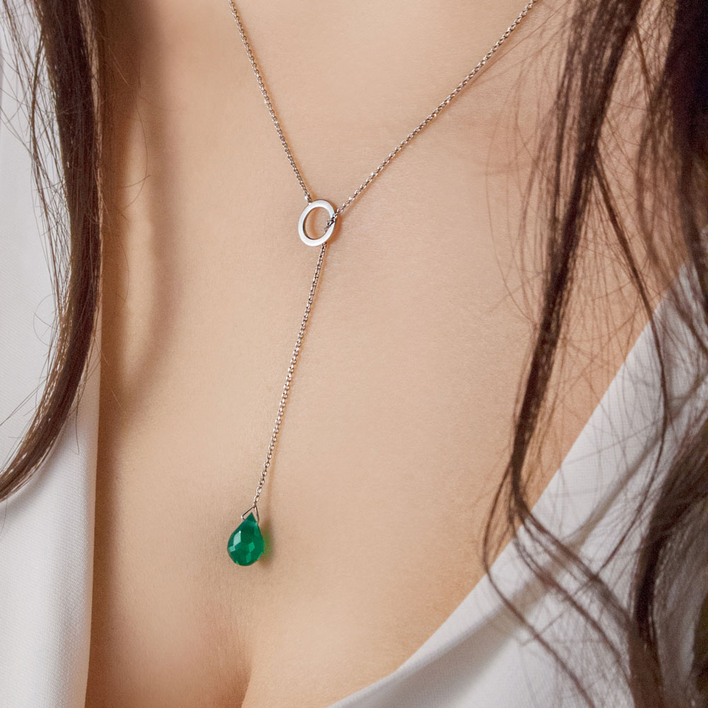 White Gold Lariat Style Necklace with a Green Agate Worn By A Woman