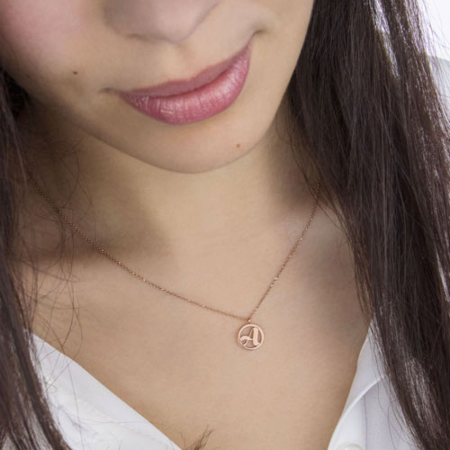 Monogram Pendant Necklace In Rose Gold Worn By A Woman