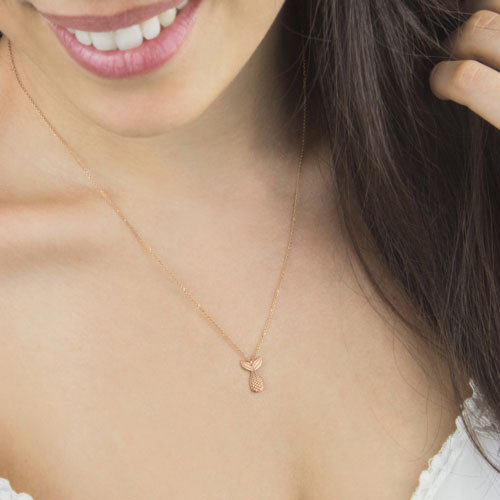 Dainty Mermaid Tail Pendant Necklace in Rose Gold Worn By A Woman