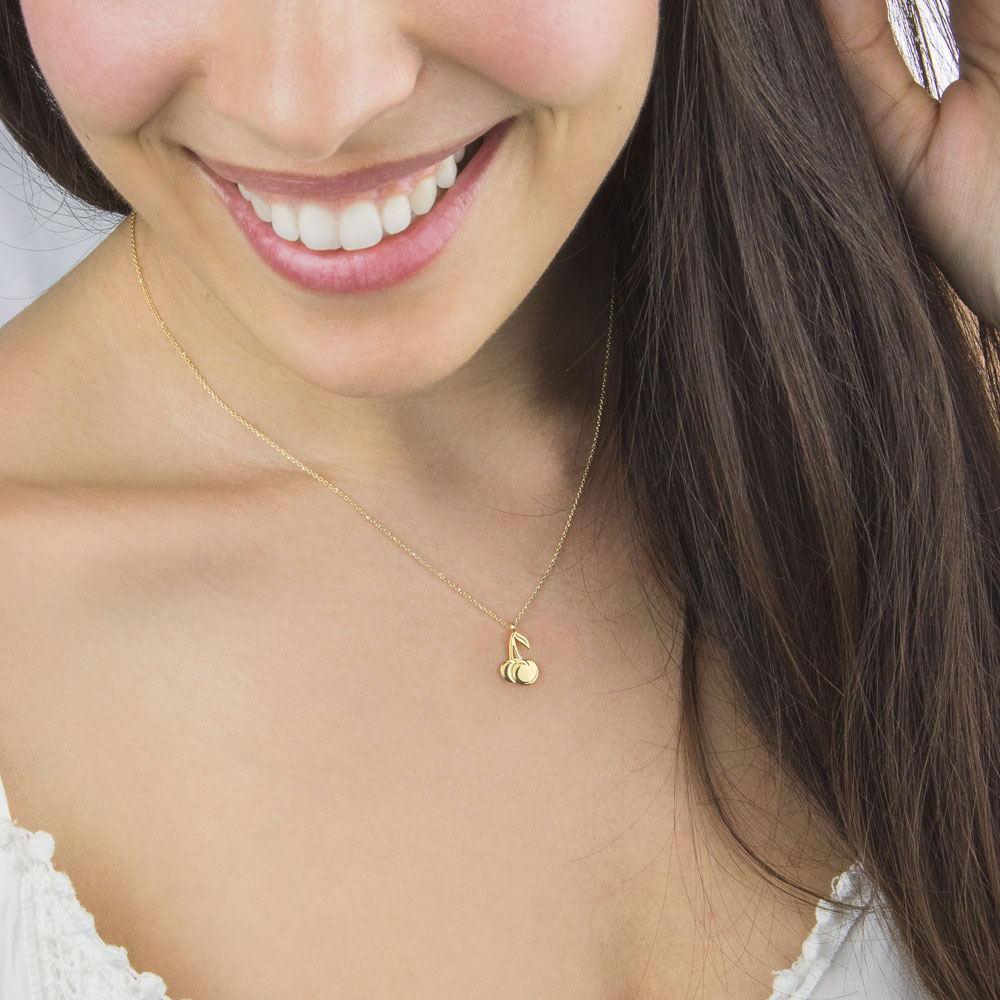 Double Cherry Pendant Necklace in Yellow Gold Worn By A Woman