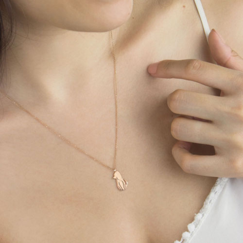 Cute Dog Pendant Necklace in Rose Gold Worn By A Woman