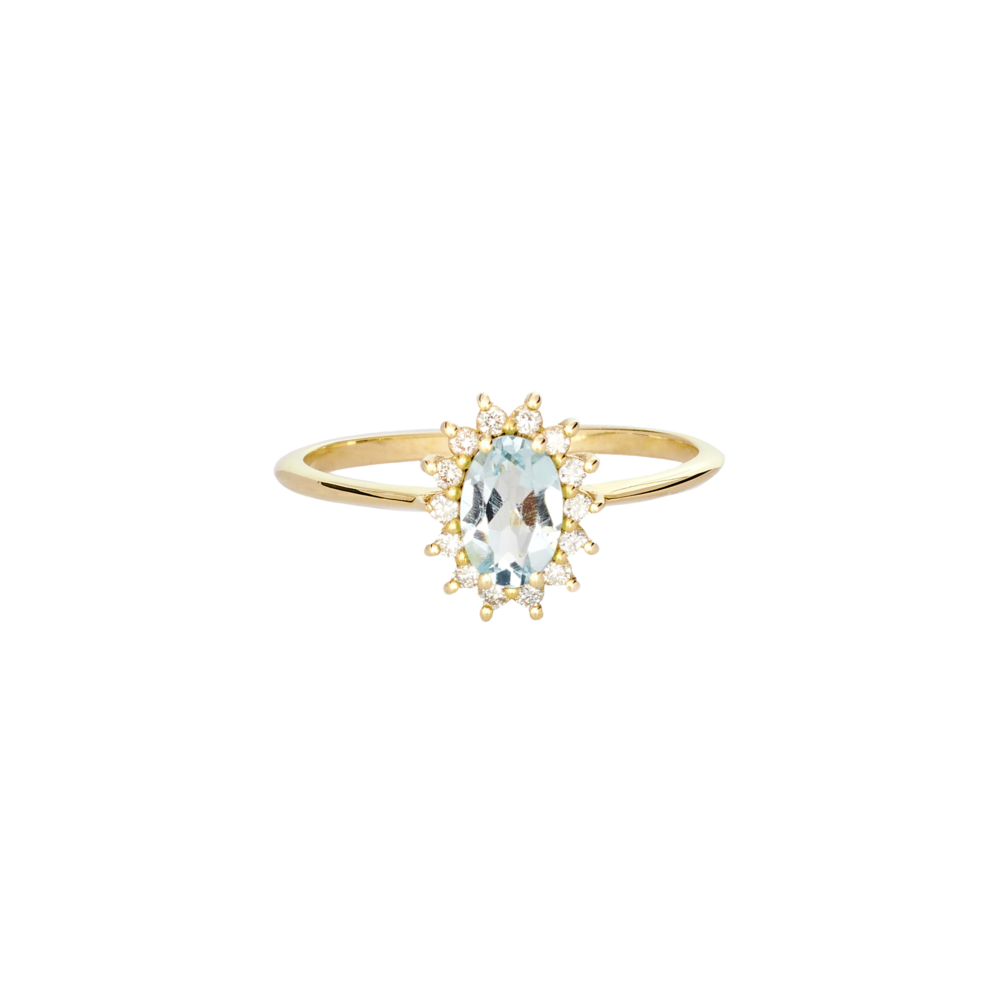 An aquamarine ring with tiny diamonds ring in yellow gold