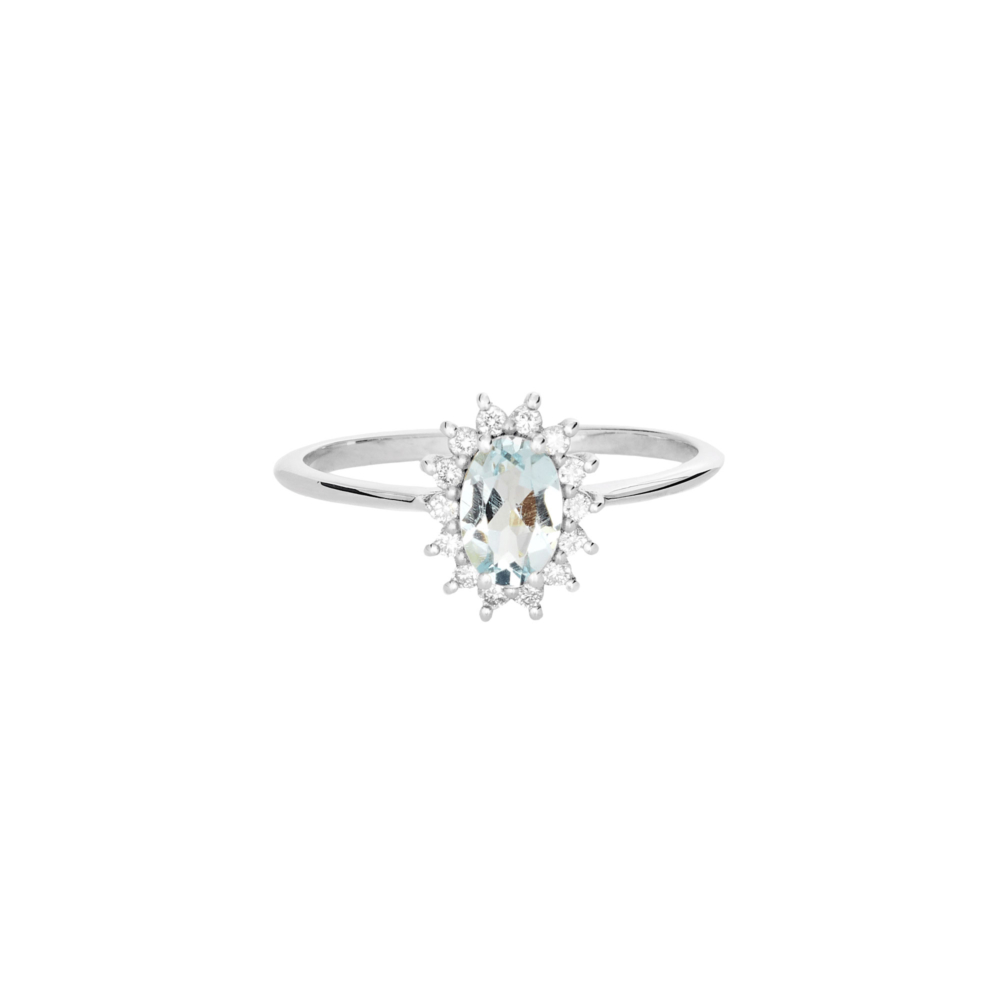 An aquamarine ring with tiny diamonds ring in white gold
