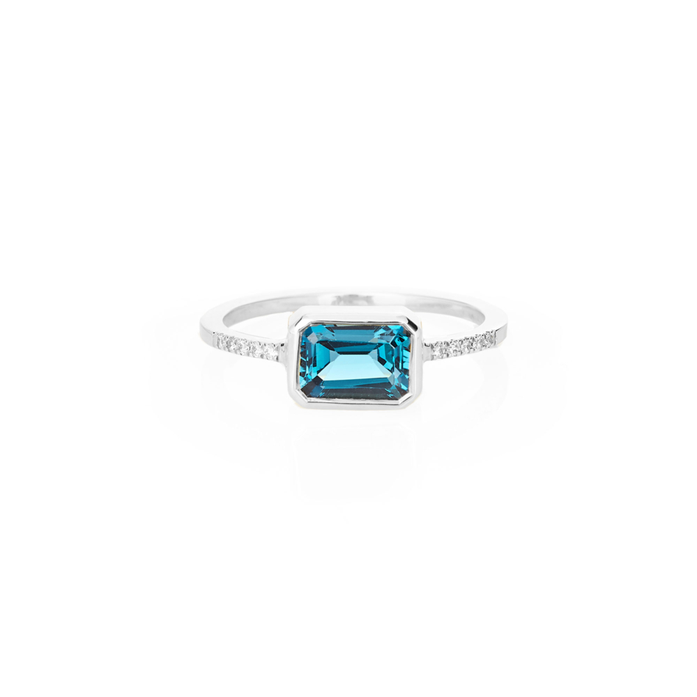 white gold ring with London blue topaz and white diamonds