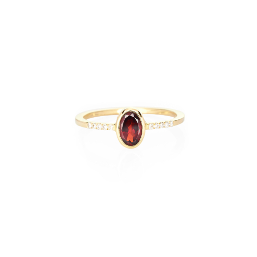 oval garnet with tiny white diamonds ring in yellow gold