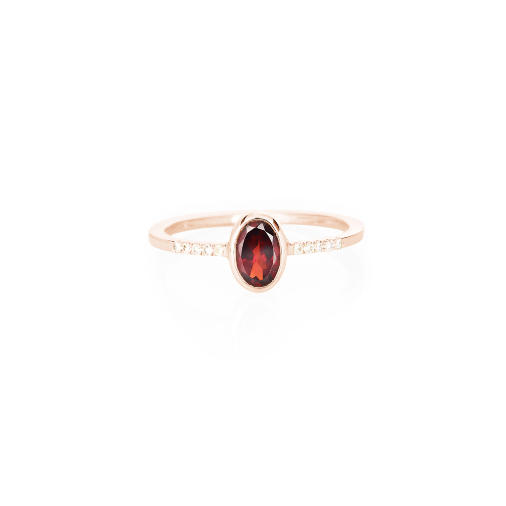 oval garnet with tiny white diamonds ring in rose gold