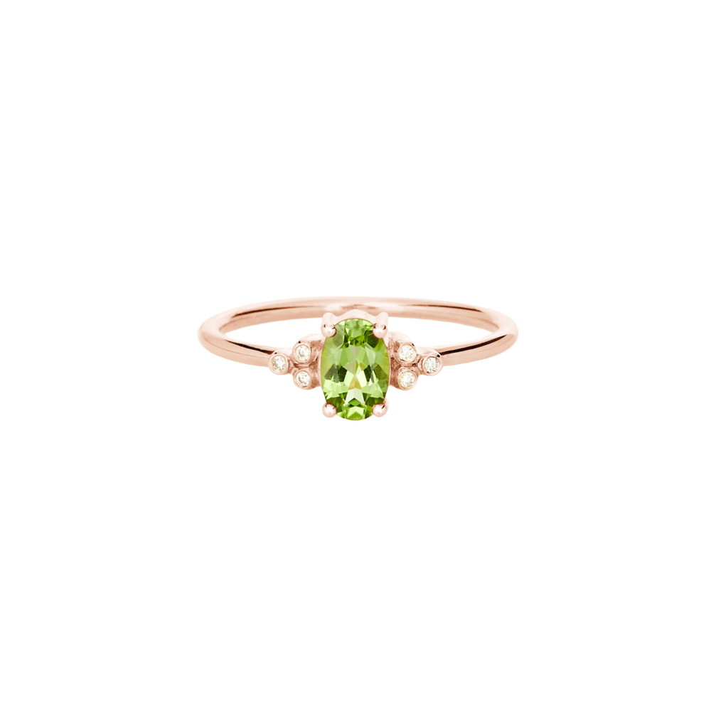 rose gold ring with a peridot and round diamonds