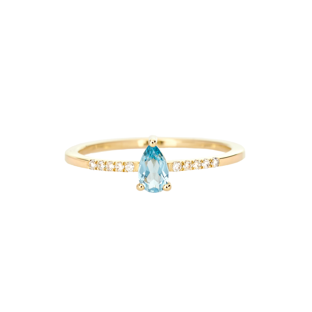 yellow gold ring with swiss blue topaz and tiny white diamonds