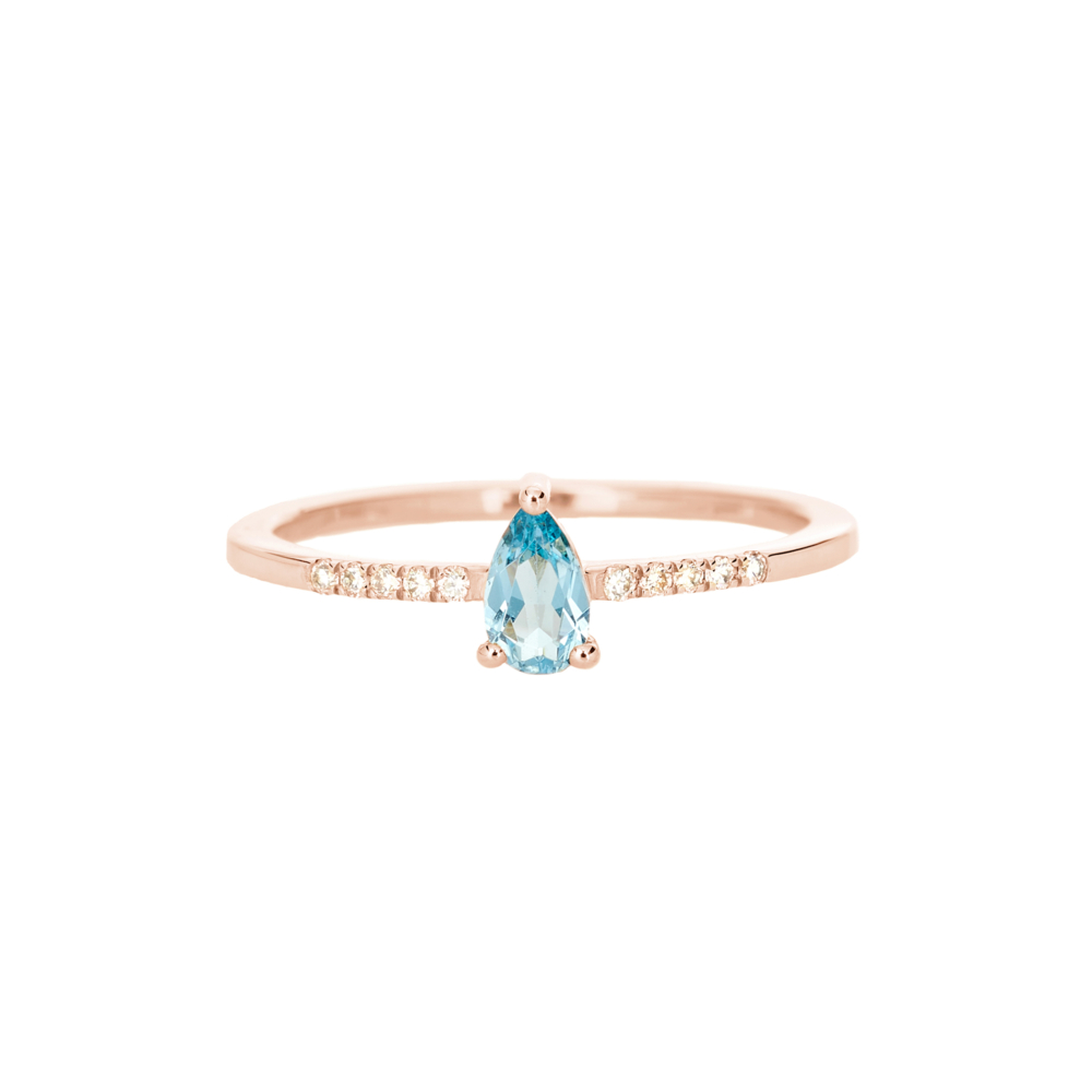 rose gold ring with swiss blue topaz and tiny white diamonds