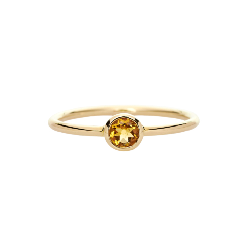 small citrine solitaire ring in yellow gold