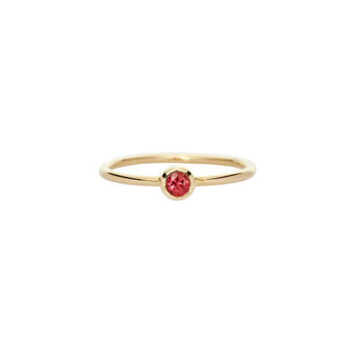 red sapphire solitaire ring in yellow gold