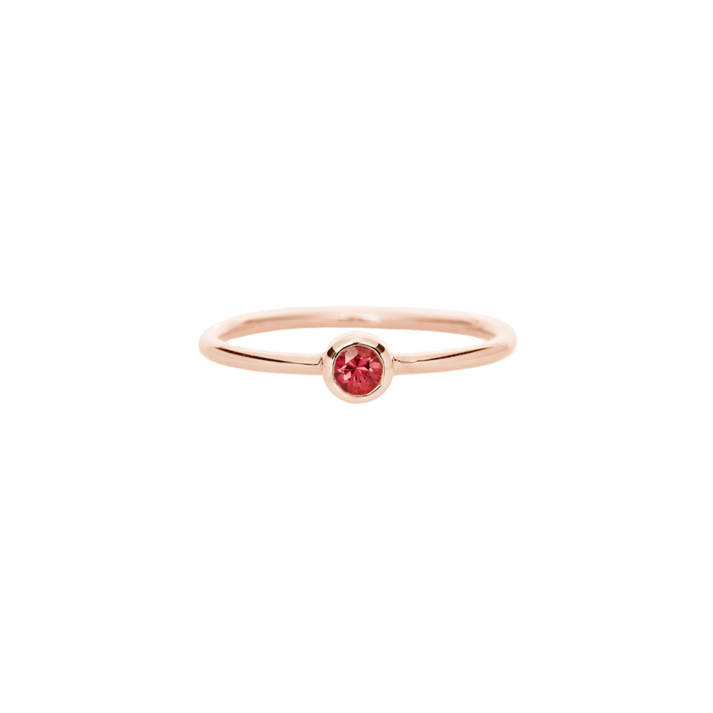 red sapphire solitaire ring in rose gold