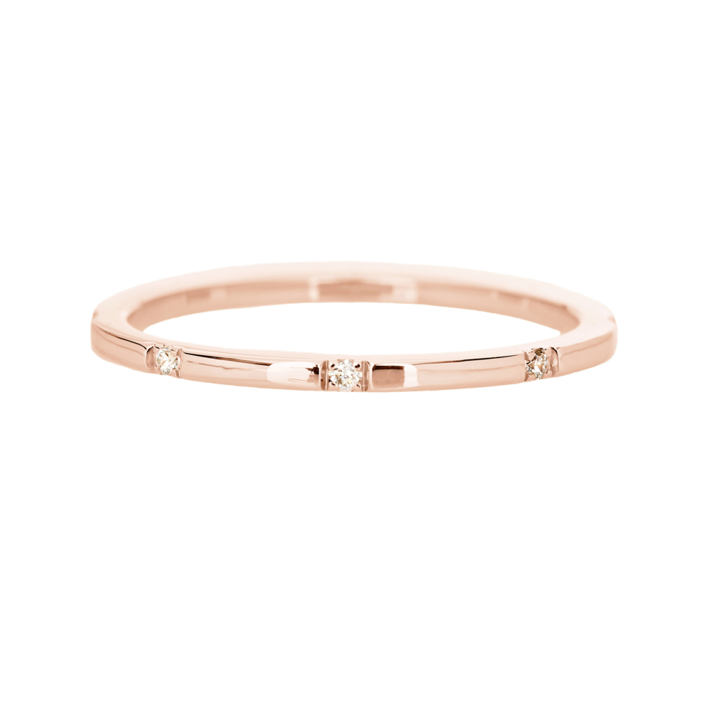 rose gold band ring with white diamonds