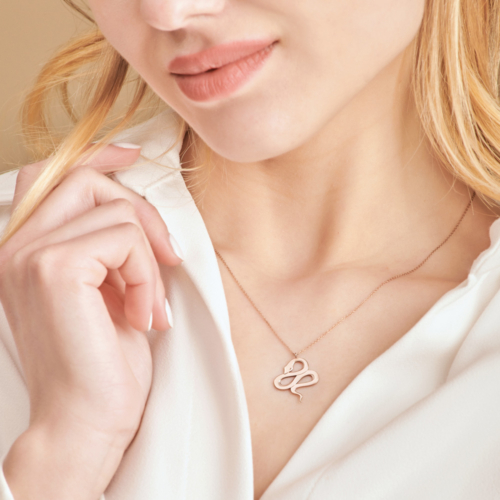 Simple Snake Pendant Necklace in rose Gold worn by a model