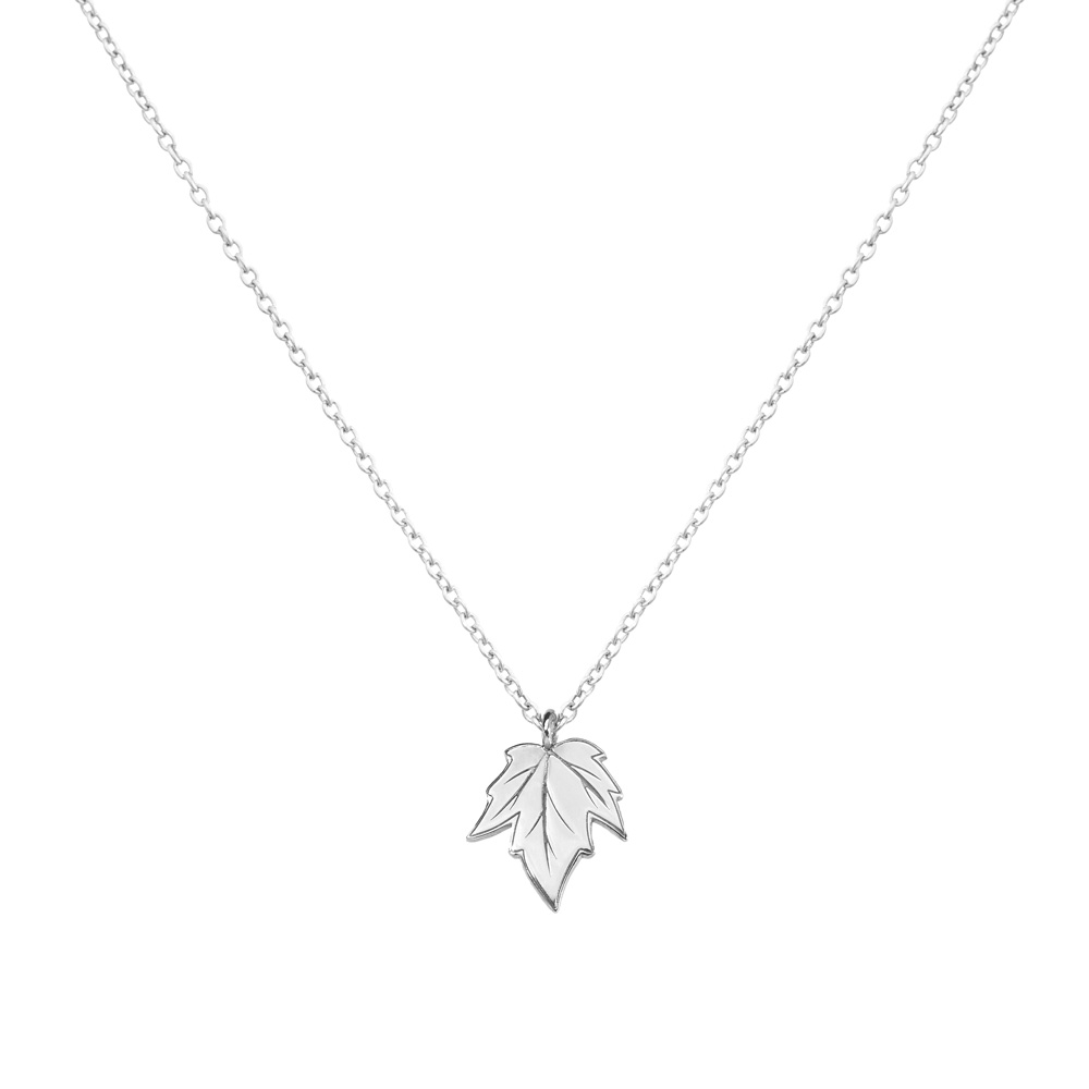 Small Maple Leaf Charm Necklace in white Gold on a white background