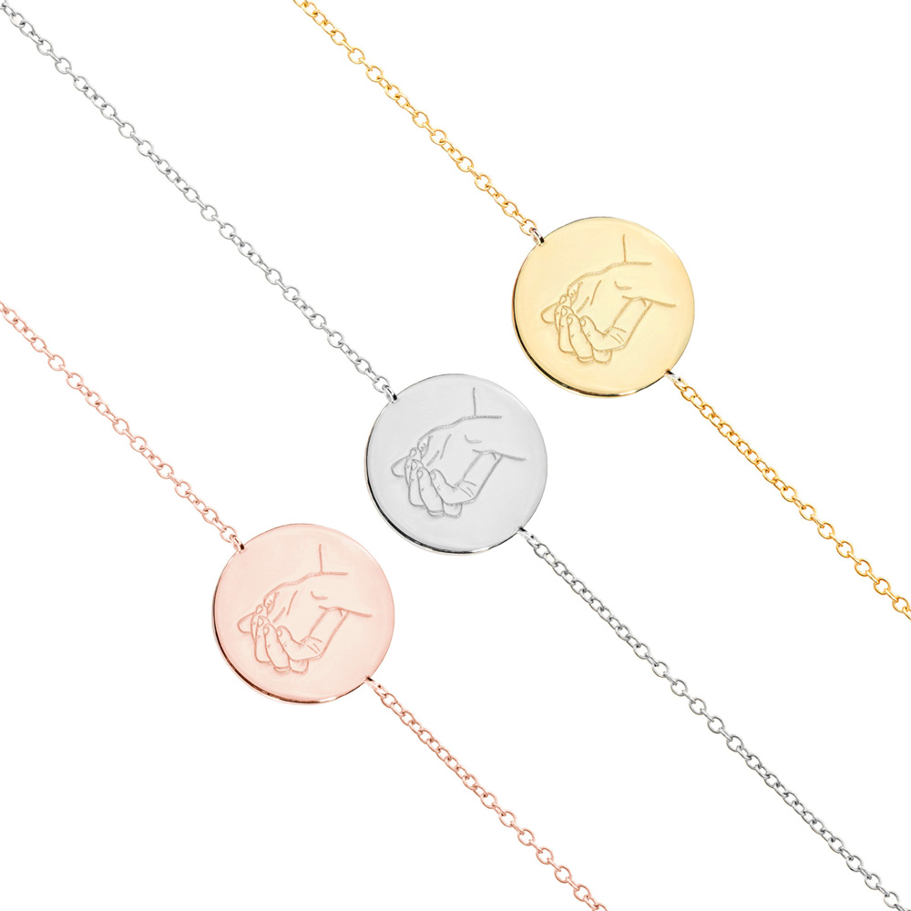 all three colour options of the Holding Hands Charm Bracelet in Solid Gold