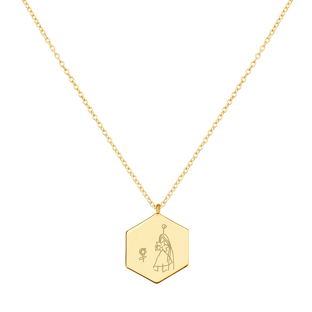 an Engraved, hexagon shaped Child's Drawing pendant Necklace in yellow Gold